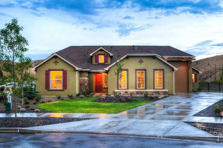 Single-story home with a freshly repaired concrete driveway in Little Elm, TX