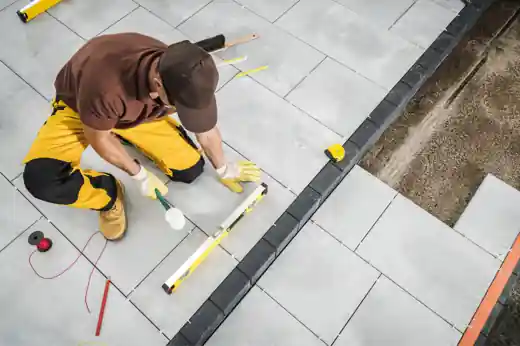 Concrete patio being laid in a Little Elm backyard